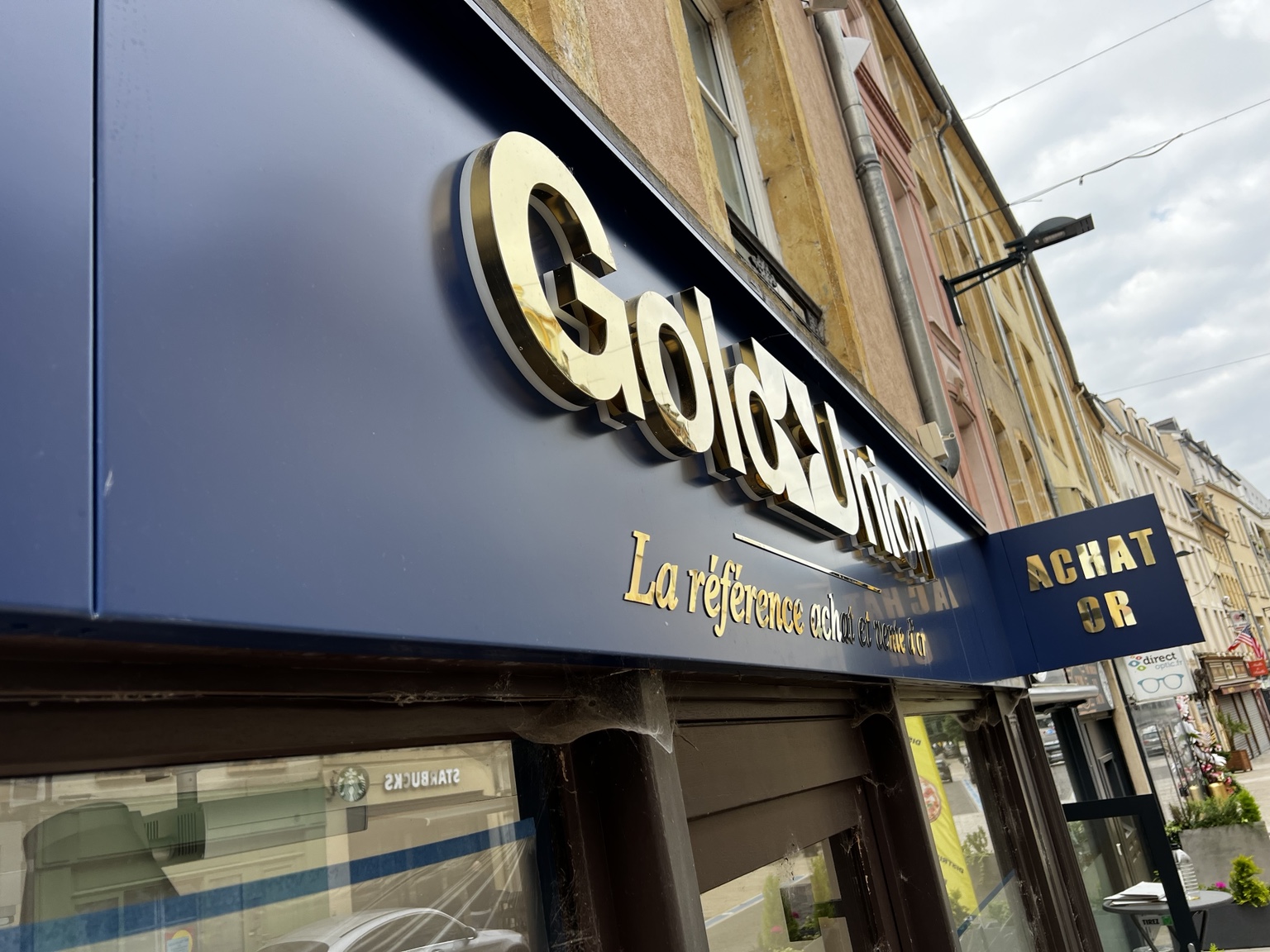 Gold & Cash — Enseigne de boutique